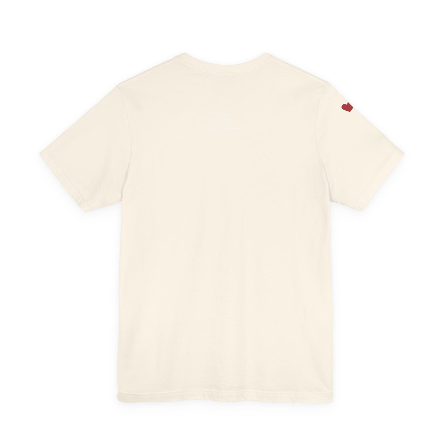 Beige t-shirt with a small red heart on the back against a white background