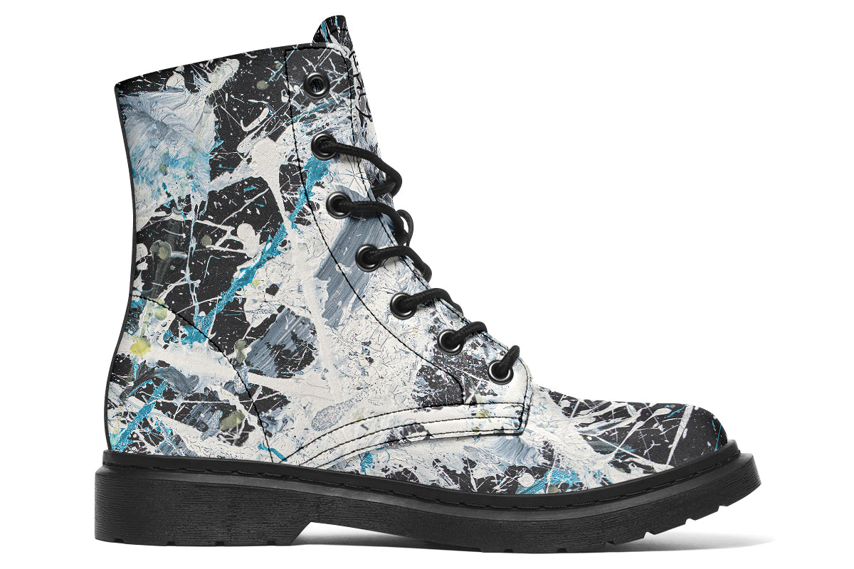 Black lace-up boot with a multicolor abstract pattern on a white background