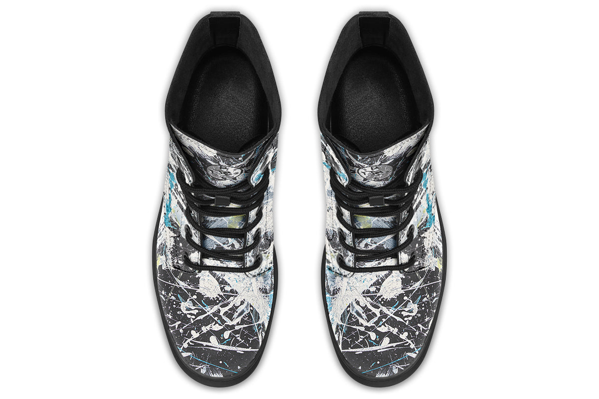 Pair of black and white patterned shoes on a white background