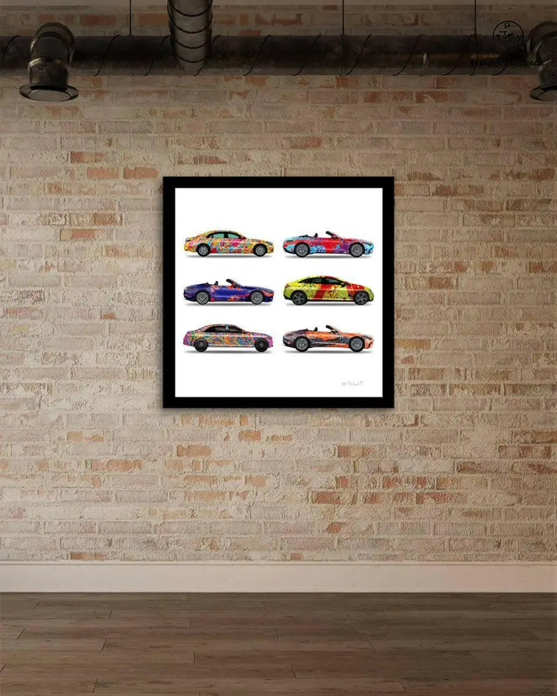 Six colorful car prints by Jumper Maybach on paper, stacked together with vibrant brick gallery background.