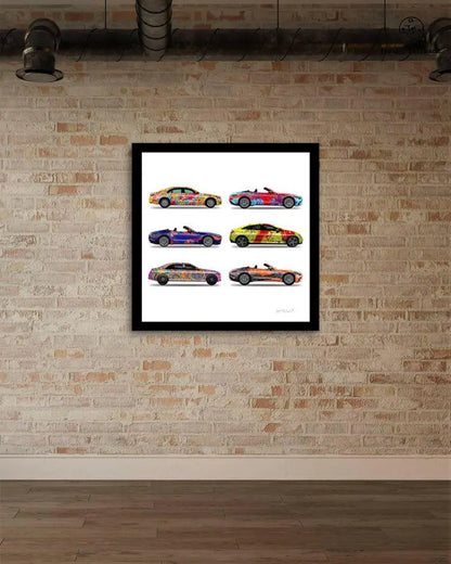Six colorful car prints by Jumper Maybach on paper, stacked together with vibrant brick gallery background.