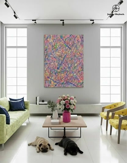 Modern living room with colorful abstract painting, green sofa, yellow chairs, and two dogs.