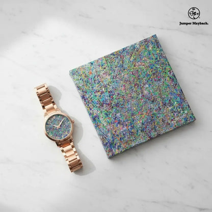 Flat lay of Boundless Beginnings Steel Strap Automatic Watch by Jumper Maybach® with indicators, featuring a sleek stainless steel strap.