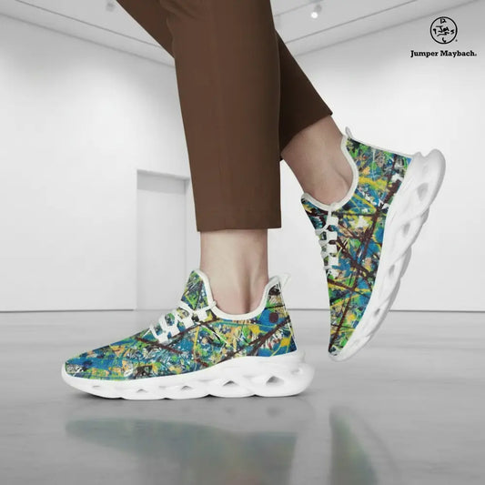 Cosmic Glee Flex Sneakers by Jumper Maybach in black and white with vibrant cosmic patterns, featuring athletic design and logo accents.