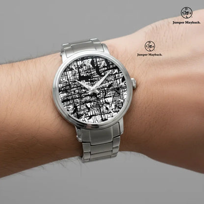 Close-up of a Dark Matrix Steel Strap Automatic Watch with indicators by Jumper Maybach® on a wrist.