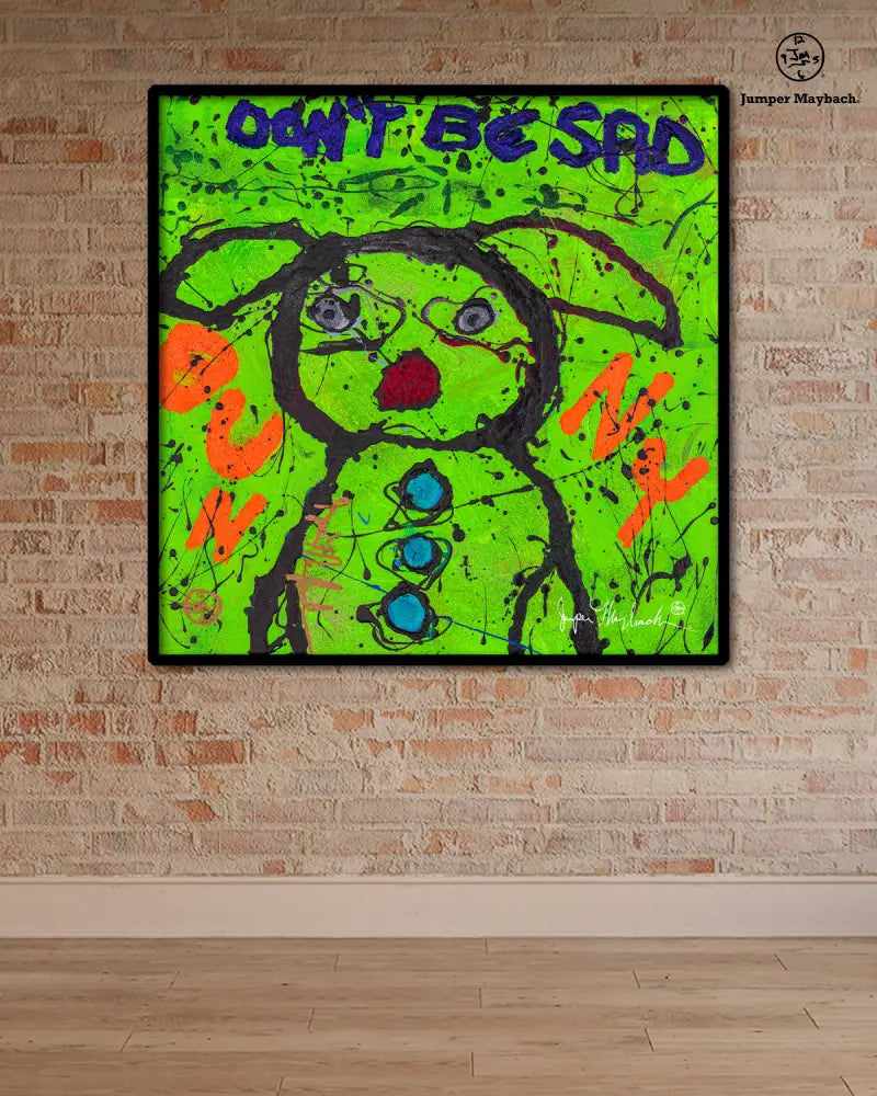 Print of a "Don't Be Sad Bunny" artwork by Jumper Maybach, featuring a whimsical bunny illustration on paper.