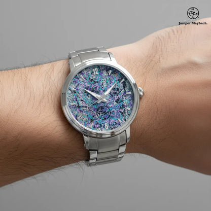 Close-up of Dream Dimension Steel Strap Automatic Watch by Jumper Maybach® showing sleek design with time indicators on the wrist.