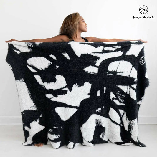 Big white DREAM JUMPER MAYBACH blanket by BIG LOViE featuring soft, plush fabric and a cozy, oversized design.
