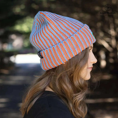 Sea blue cosmic color contrast hat by BIG LOViE, featuring a stylish design and curved brim, seen from the side view.