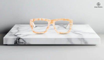 Stylish OPR The Andrea eyewear with honey-colored frames and clear lenses, featuring a modern, sleek design.