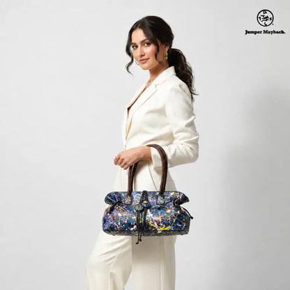 Jumper Maybach’s x Carlos Falchi Signature Satchel