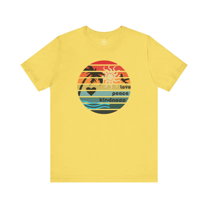 Yellow t-shirt with a colorful graphic design on a white background