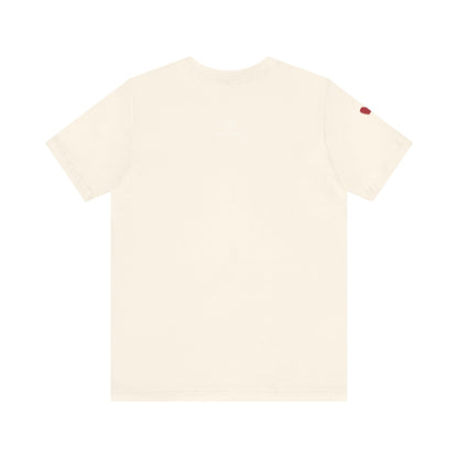 Beige t-shirt with a small red detail on a white background