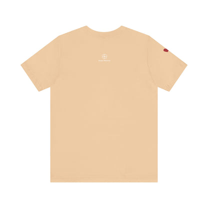 Beige t-shirt with a small logo on the chest area against a white background