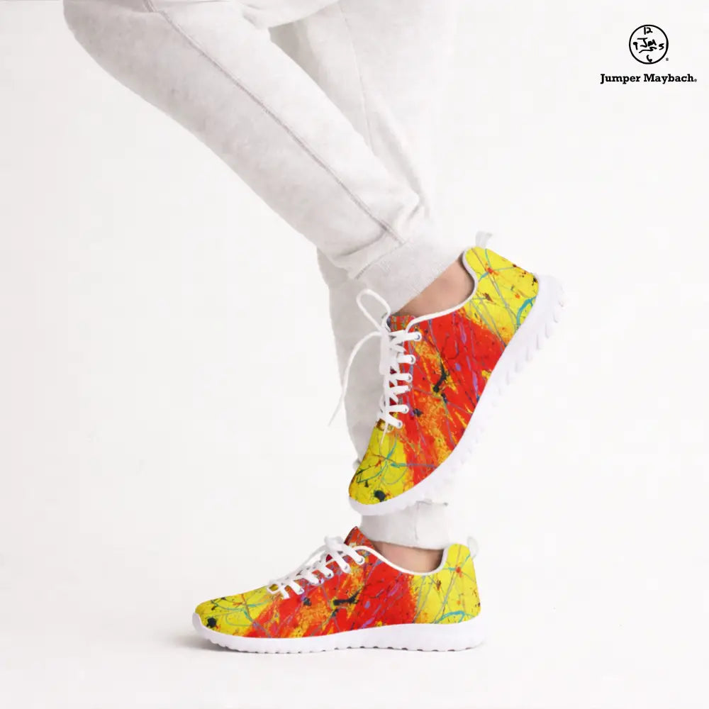 Red Rocket athletic sneakers by Jumper Maybach® with vibrant red and white design, paired with gray sweatpants.