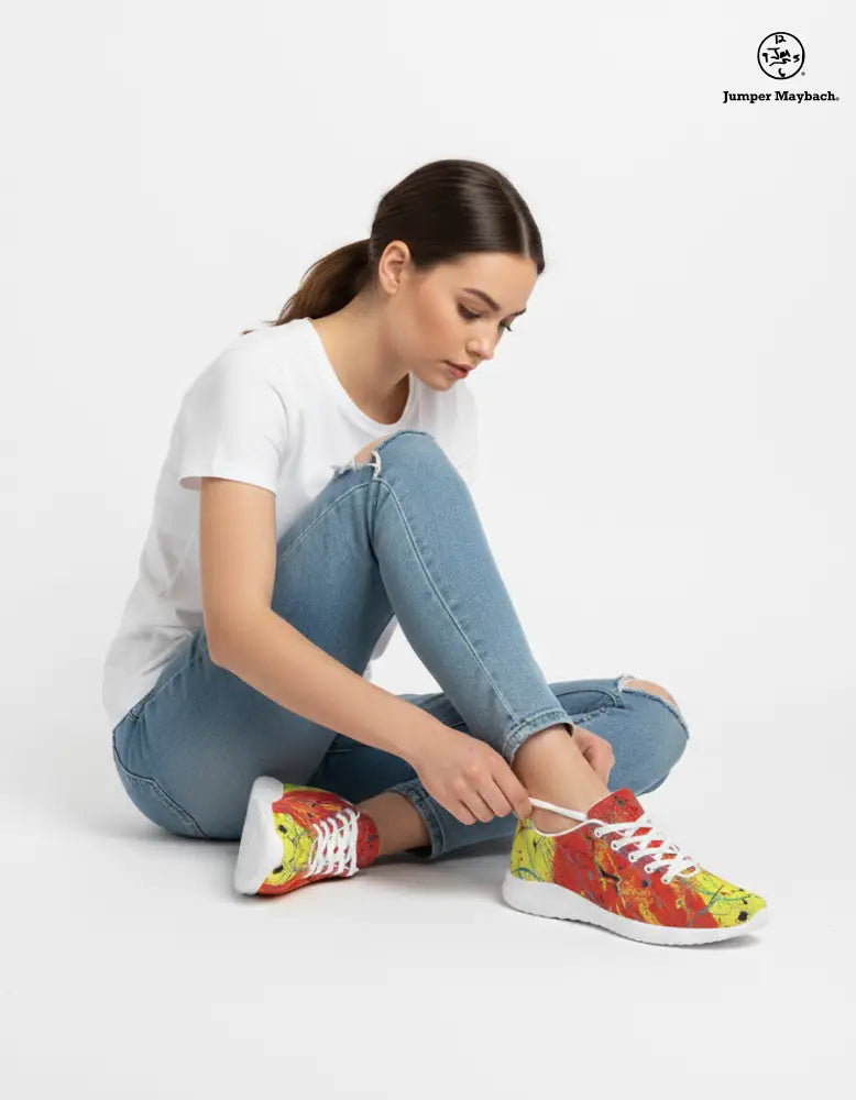 Red Rocket athletic sneakers by Jumper Maybach for men and women, featuring a sleek design and vibrant red color.