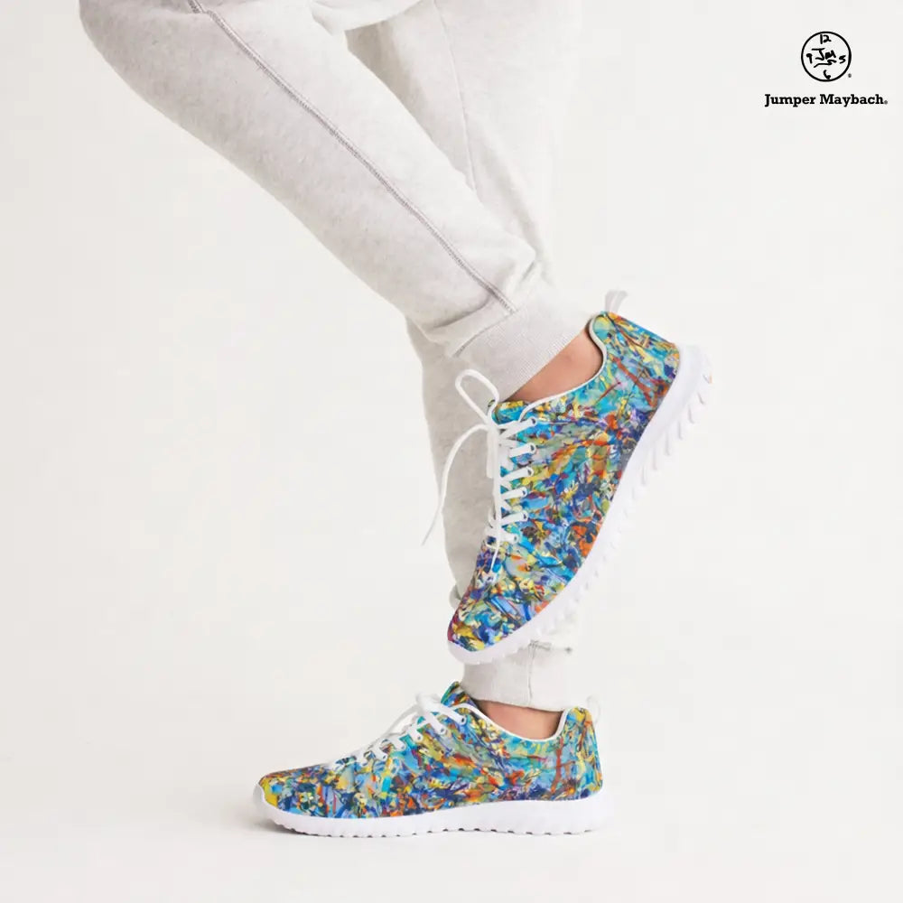 Colorful Taffy Galaxy athletic sneakers by Jumper Maybach® with gray sweatpants, showcasing vibrant design and sporty style.