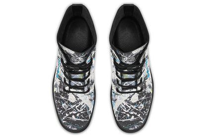 Pair of black and white patterned shoes on a white background